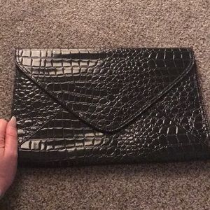 FREE WITH BUNDLE OF 4 or more XL black  clutch